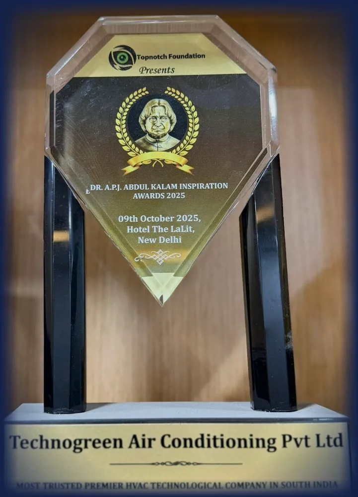 Crystal trophy engraved Topnotch Foundation presents Dr. A.P.J. Abdul Kalam Inspiration Awards 2025, 09th October 2025, Hotel The LaLit, New Delhi, on a base plate reading Technogreen Air Conditioning Pvt Ltd, Most Trusted Premier HVAC Technological Company in South India.