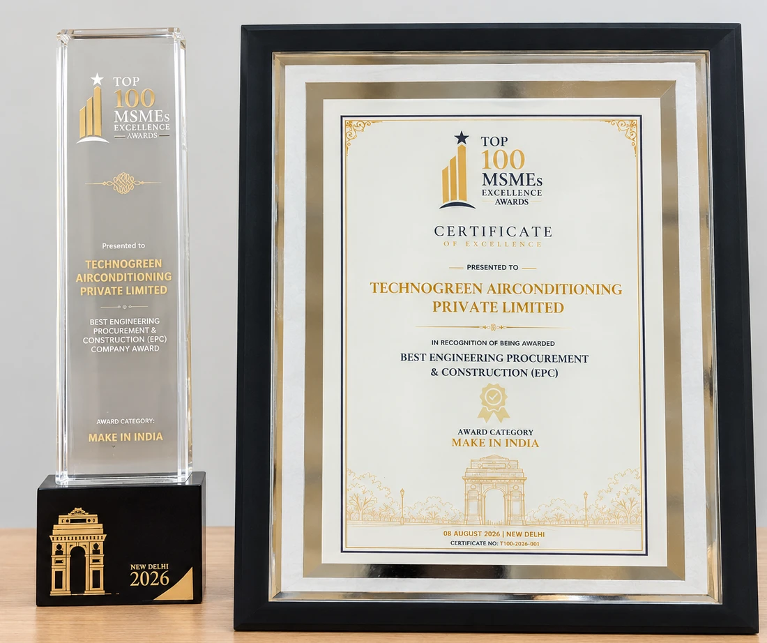 A glass Top 100 MSMEs Excellence Awards trophy on a black base lettered New Delhi 2026, standing beside its framed Certificate of Excellence presented to Technogreen Airconditioning Private Limited in recognition of being awarded Best Engineering Procurement and Construction (EPC), award category Make in India, 08 August 2026, New Delhi.