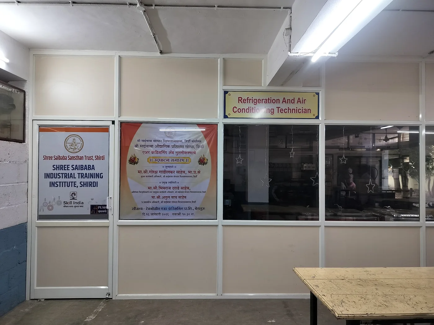 The institute's Refrigeration and Air Conditioning Technician workshop, equipment ranged along the far wall.